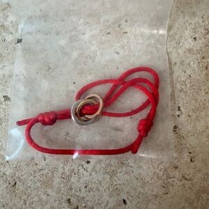 Adjustable Red Cord Bracelet with Three Color Rings